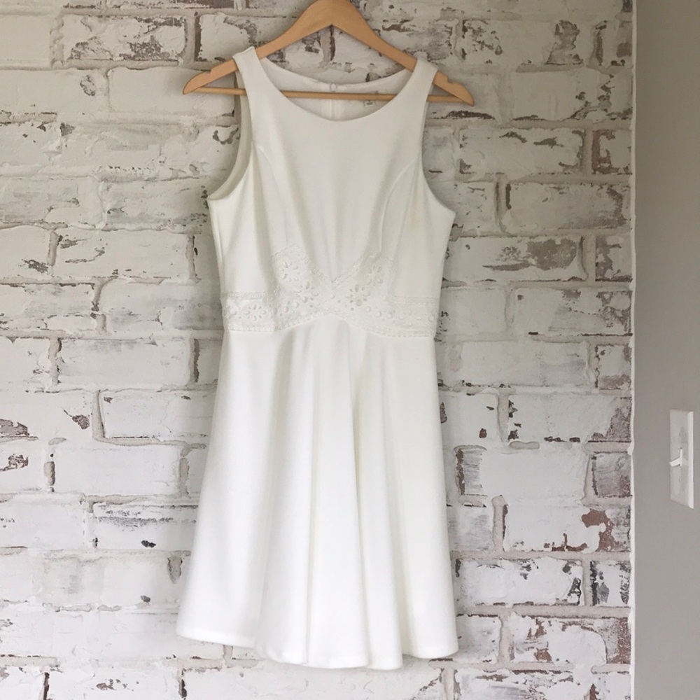 Off white dress with eyelet detail.